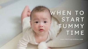 Tummy time for newborn on a soft play mat, baby lifting head while supervised, promoting early muscle development.